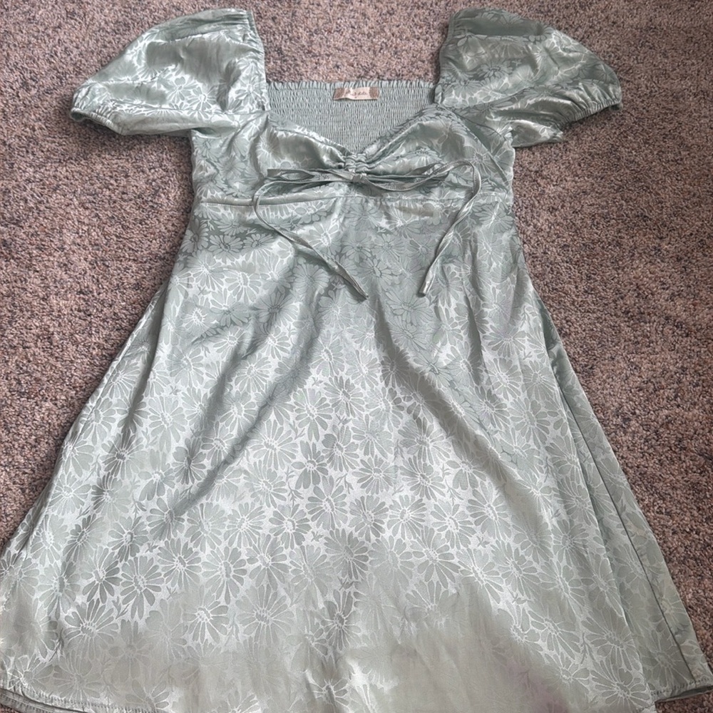 Excellent condition light green open back dress.